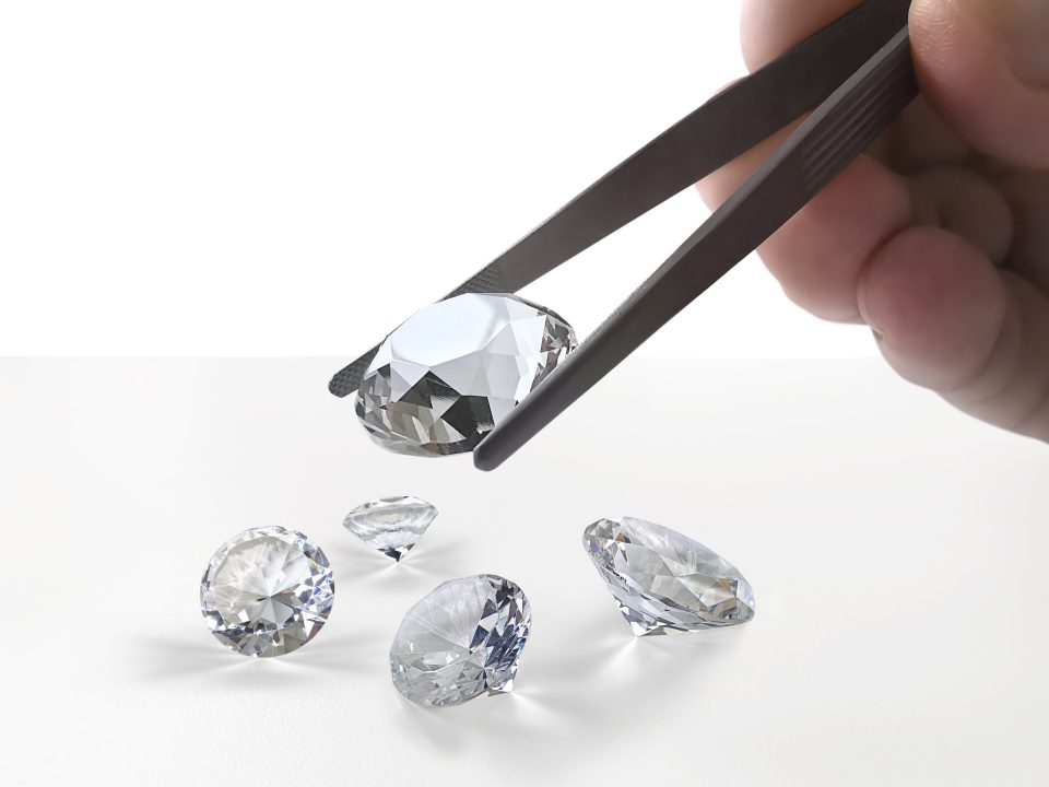 brilliant-cut-diamond-held-by-tweezers-960x720-1.jpg