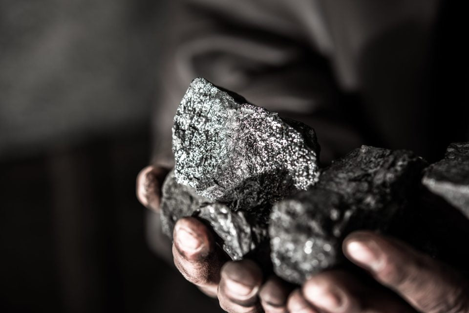 coal-mining-coal-miner-man-hands-coal-background-picture-idea-about-coal-mining-ener-scaled-1-960x641.jpg