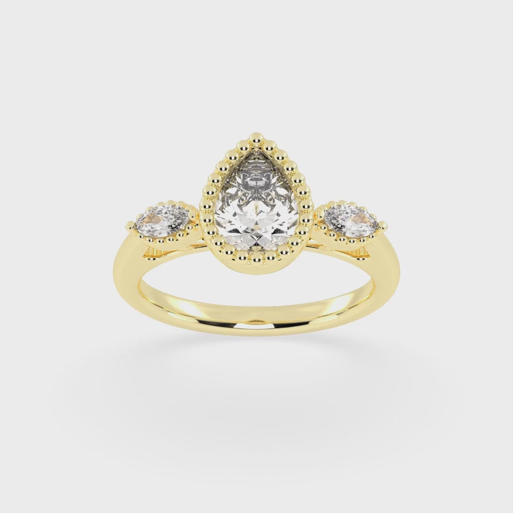 Three Stone Lab Grown Diamond Engagement Ring with Pear Cut Center Stone and Marquise Side Stones