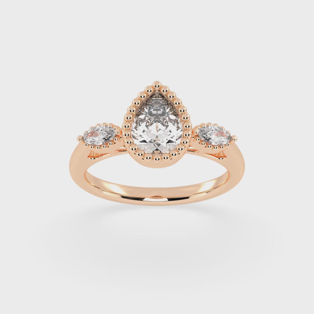 Three Stone Lab Grown Diamond Engagement Ring with Pear Cut Center Stone and Marquise Side Stones