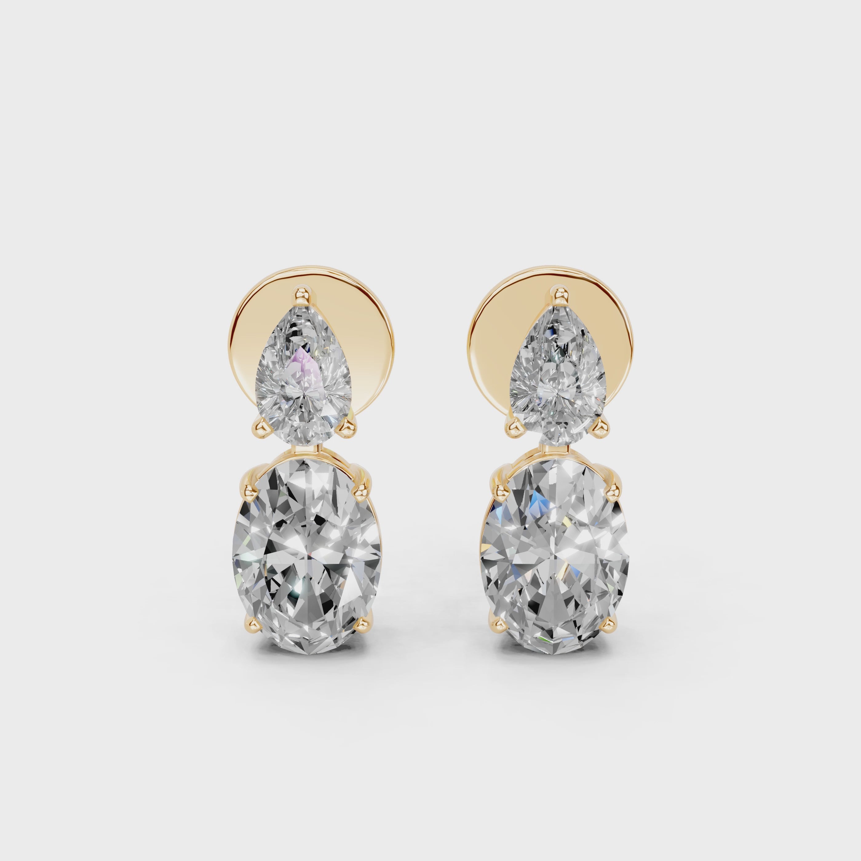 Two stone pear and oval 3.9 cttw lab grown diamond earrings