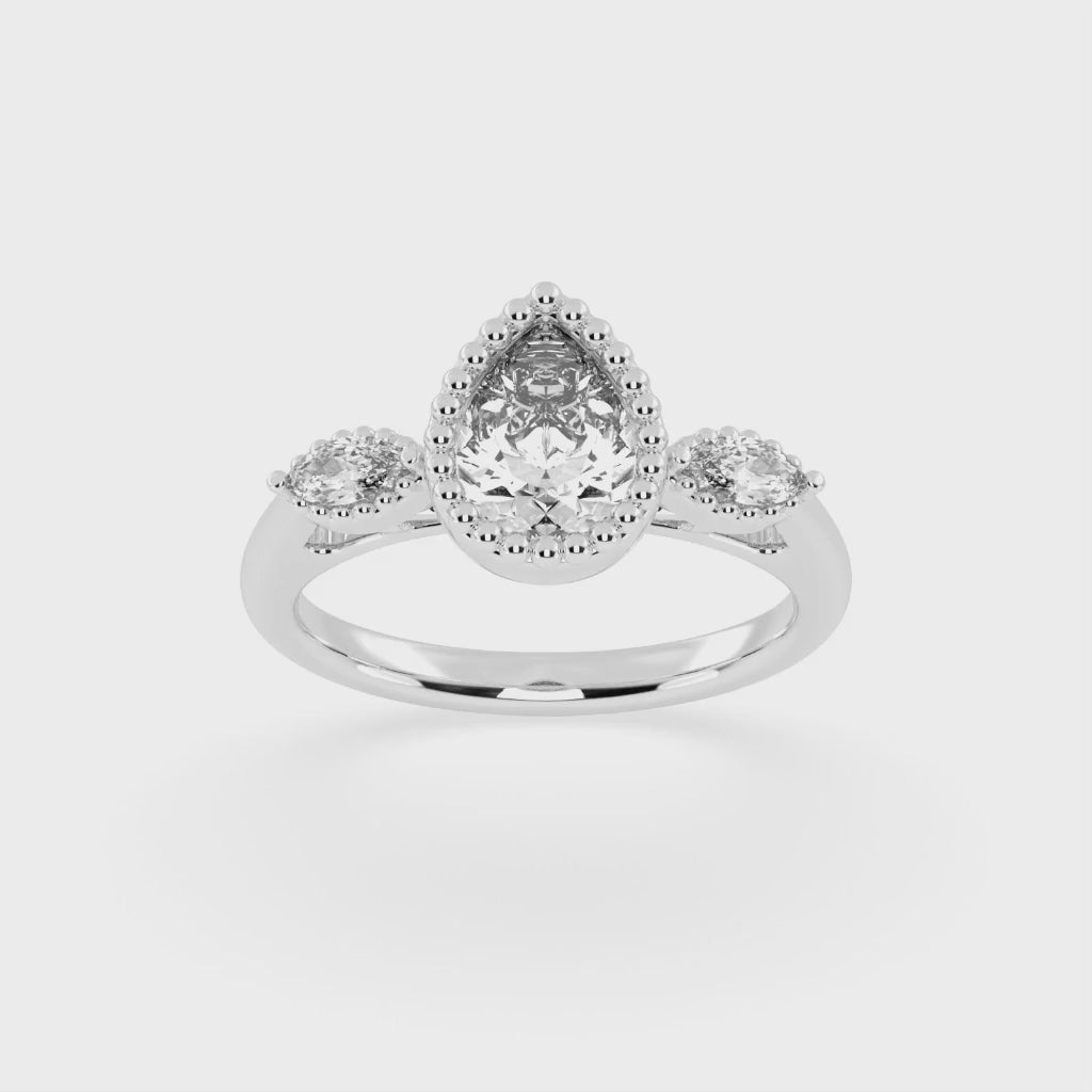 Three Stone Lab Grown Diamond Engagement Ring with Pear Cut Center Stone and Marquise Side Stones